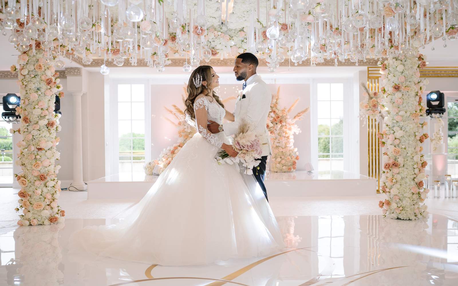 A Bride & Groom enjouing a romantic first dance in the Grand Ballroom. The Grand Ballroom has a capacity of 300 guests for your wedding reception.