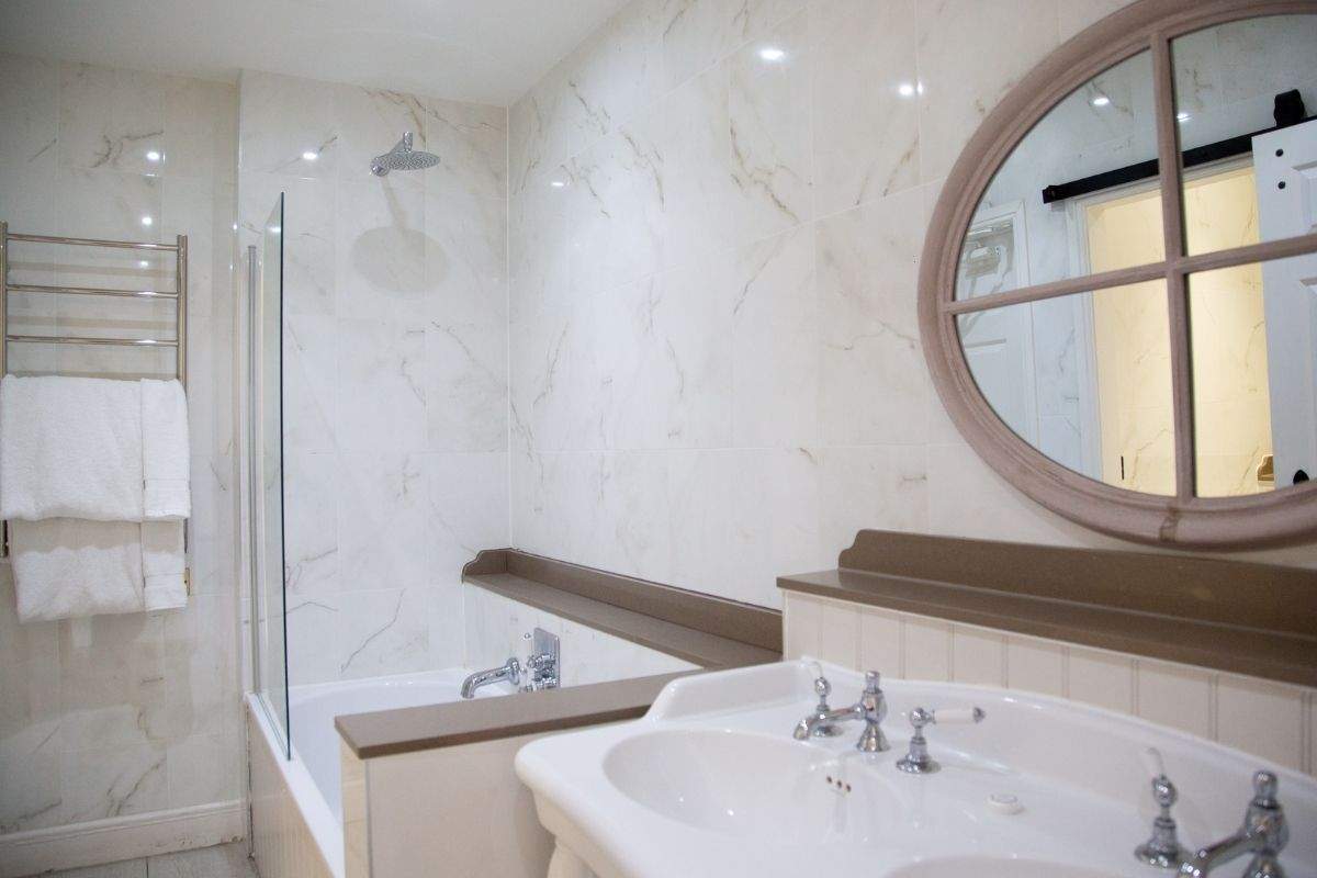 Bright bathroom in Surrey wedding accommodation with hotel-style comforts