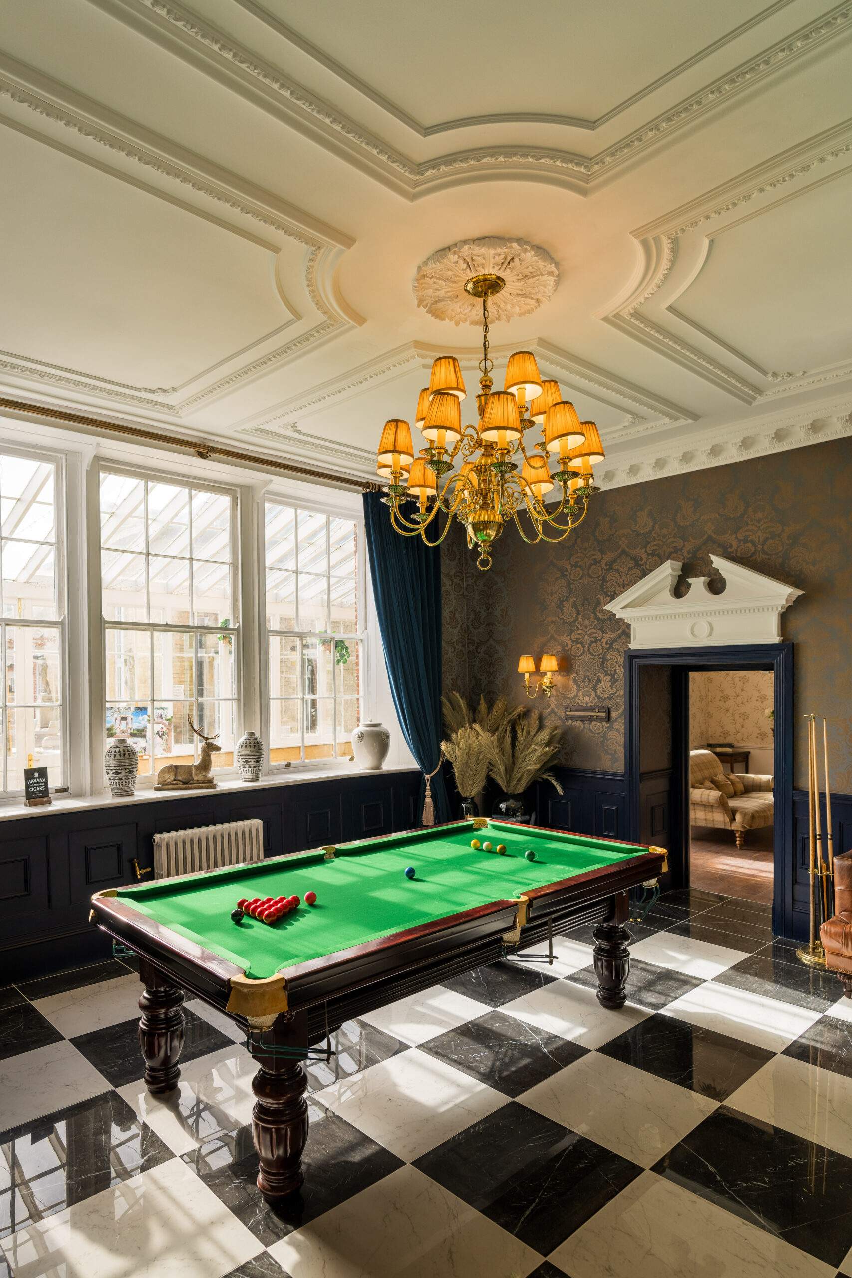 The Groom's Lounge is a designated getting ready space for the Groomsmen at our exclusive Surrey wedding venue, featuring a snooker table and cigar humidor.