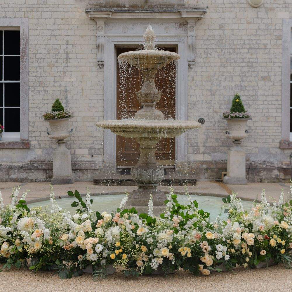 Froyle Park is excluisive-use wedding venue on the Surrey / Hampshire border, featuring a tumbling water fountain and a grand entrance.