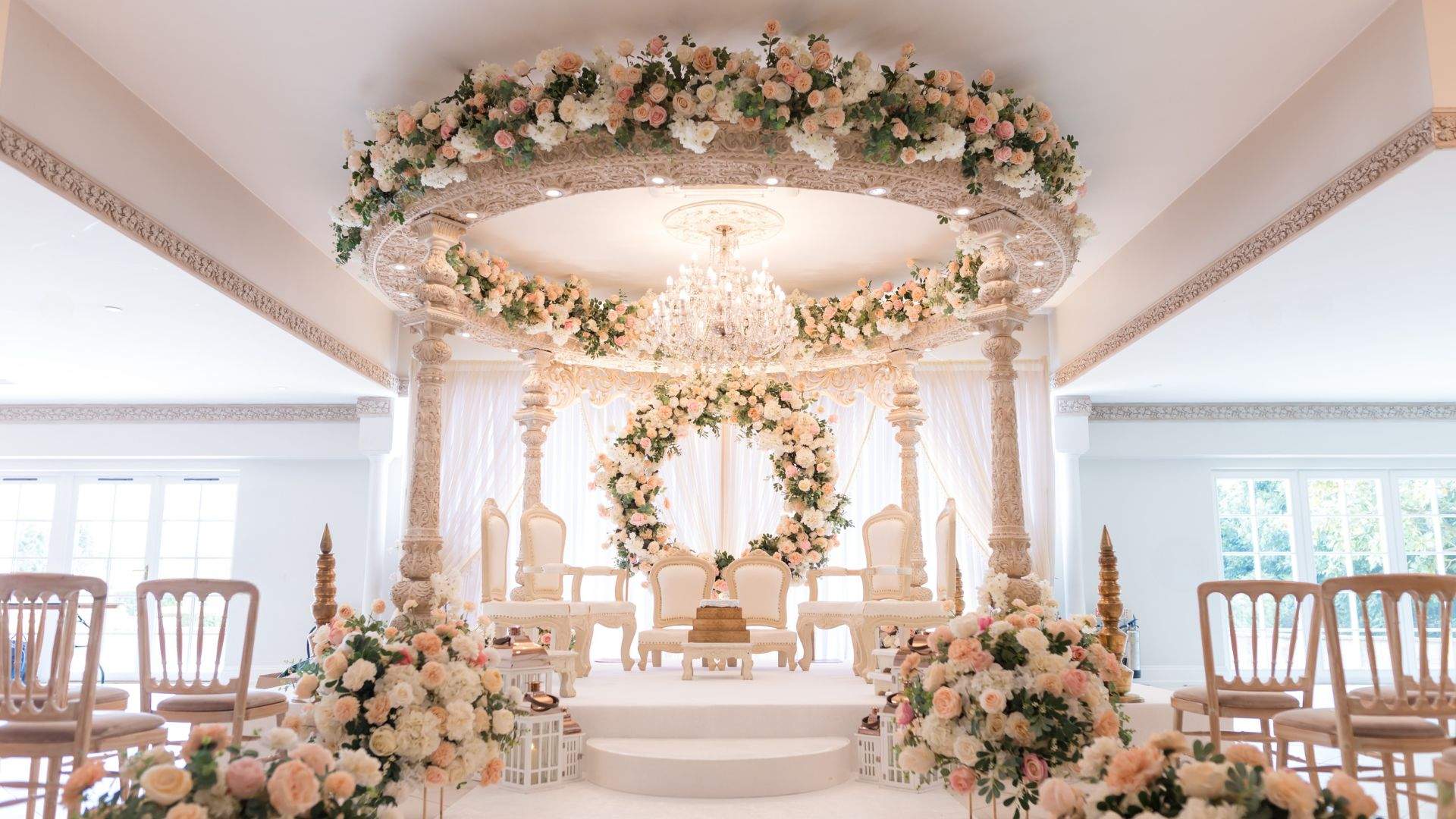 A Hindu mandap setup for a Gujarati wedding ceremony in the Grand Ballroom at Froyle Park, Hampshire.